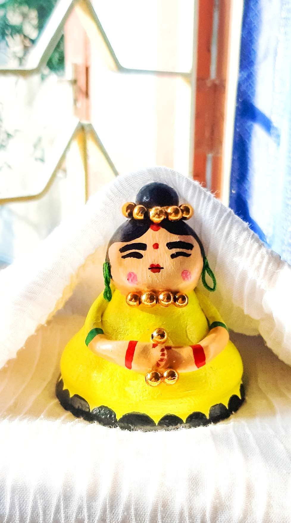 Earthen doll